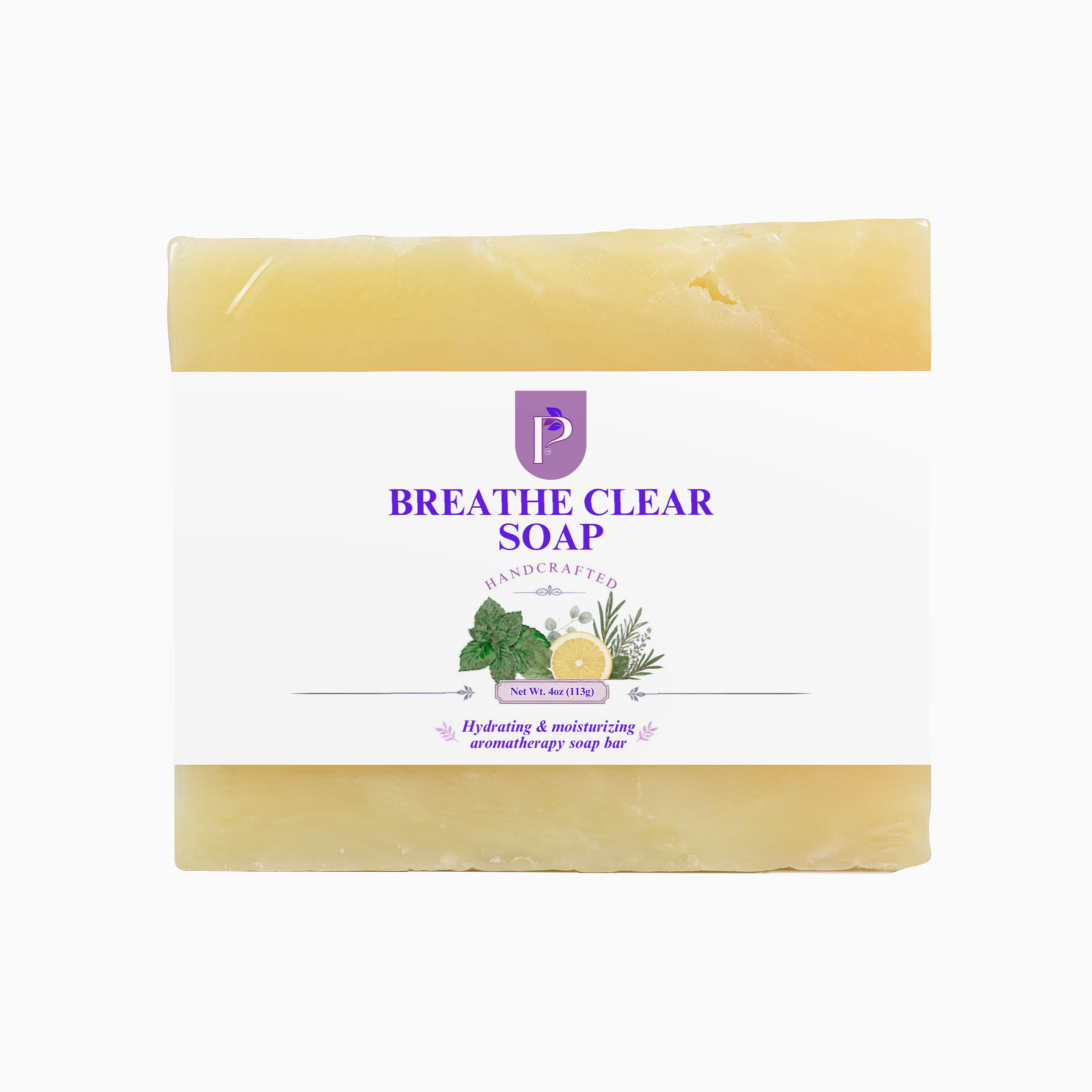 A rectangular bar of handcrafted soap with a white paper label, featuring a purple 'BREATHE CLEAR SOAP' logo and botanical illustrations. The soap itself is a pale yellow color, visible at the top and bottom edges of the label.