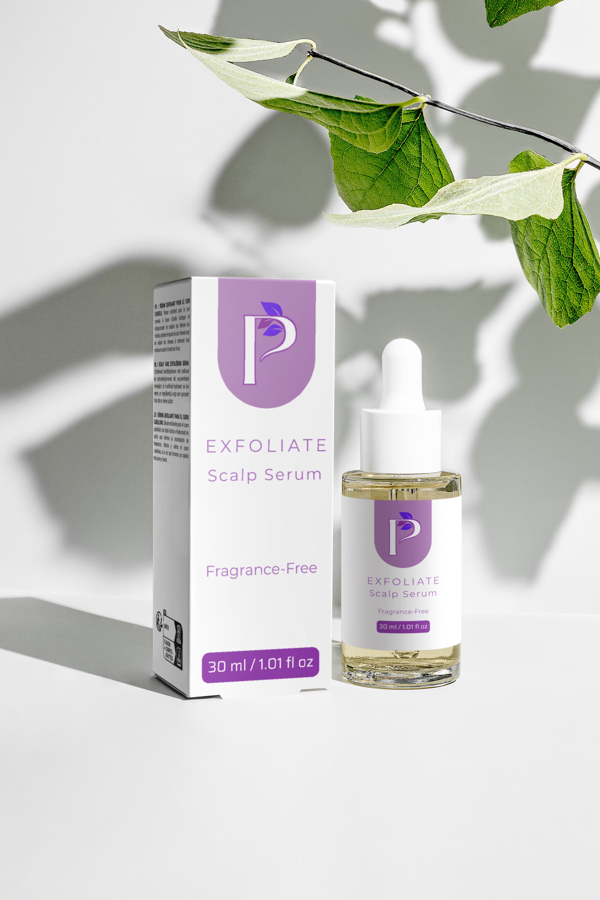 Exfoliate Scalp Serum by P with its white and purple packaging box and glass dropper bottle, styled with green leaves on a white background with leaf shadows.