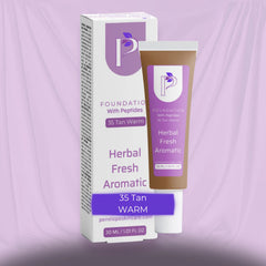A cosmetic foundation tube labeled 'Herbal Fresh Aromatic' stands in front of its matching retail box. The packaging is white with purple branding and text, and the tube has a white cap with a brown-tan body.
