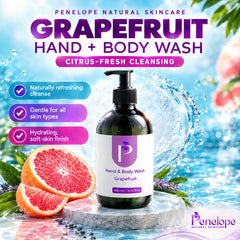 Penelope Natural Skincare Grapefruit Hand & Body Wash in a dark amber pump bottle with a white and purple label, set against a vibrant citrus and water splash background with sliced grapefruit.