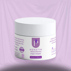 A white jar of Keratin Intensive Recovery Hair Mask with purple text and logo, set against a draped lavender background.
