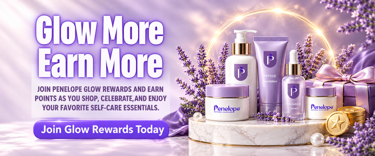 Promotional banner for Penelope Glow Rewards featuring several lavender and purple skincare products on a marble pedestal, surrounded by lavender sprigs, pearls, and gold coins, with text reading 'Glow More Earn More' and 'Join Glow Rewards Today'.