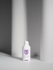 Peptide Eye Cream eye cream bottle on a gray background